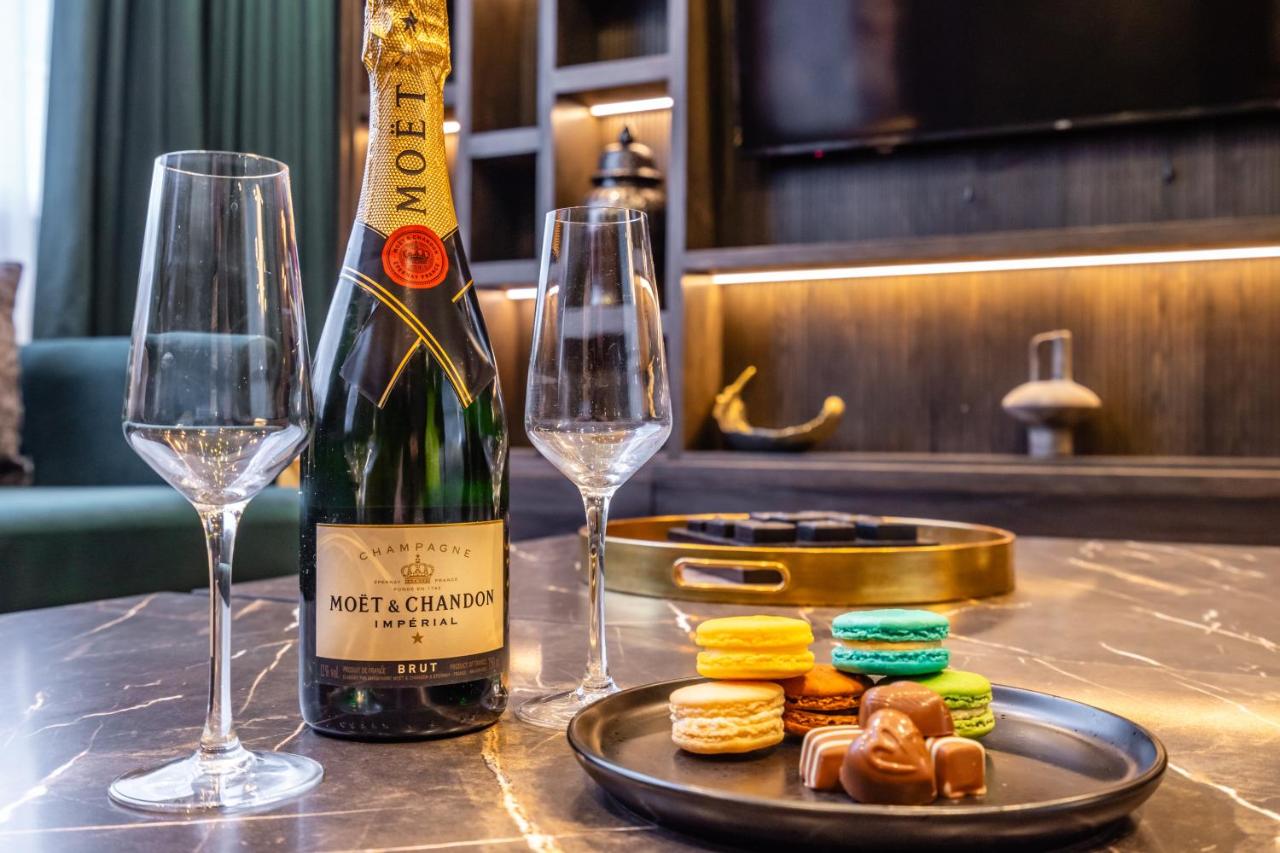 a bottle of wine and two glasses on a table at 34 Coney Street in York