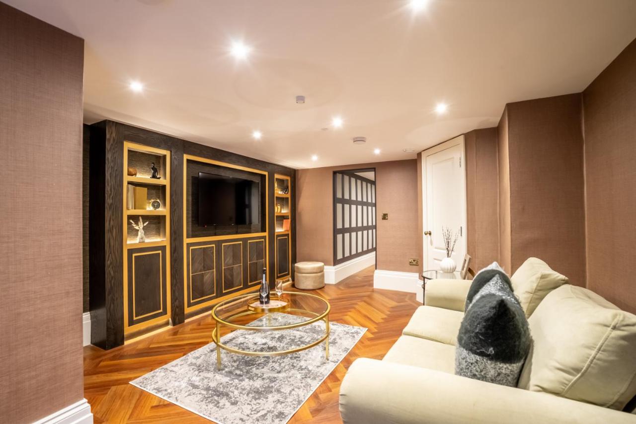 a living room with a couch and a table at 34 Coney Street in York